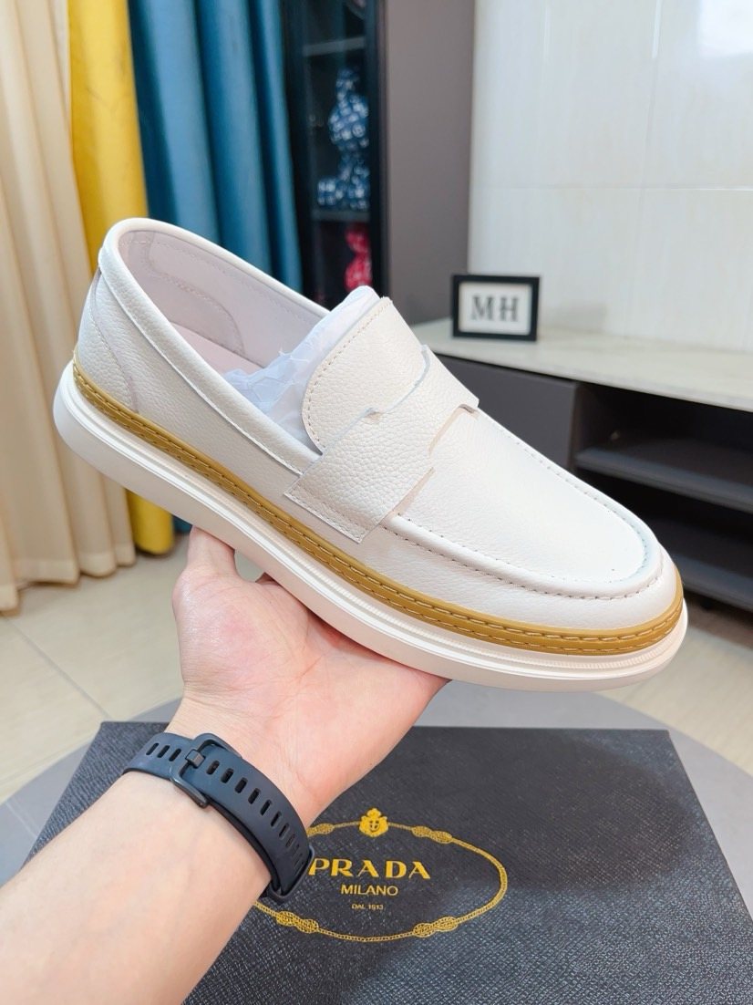 Prada Textured Slip-On Shoes